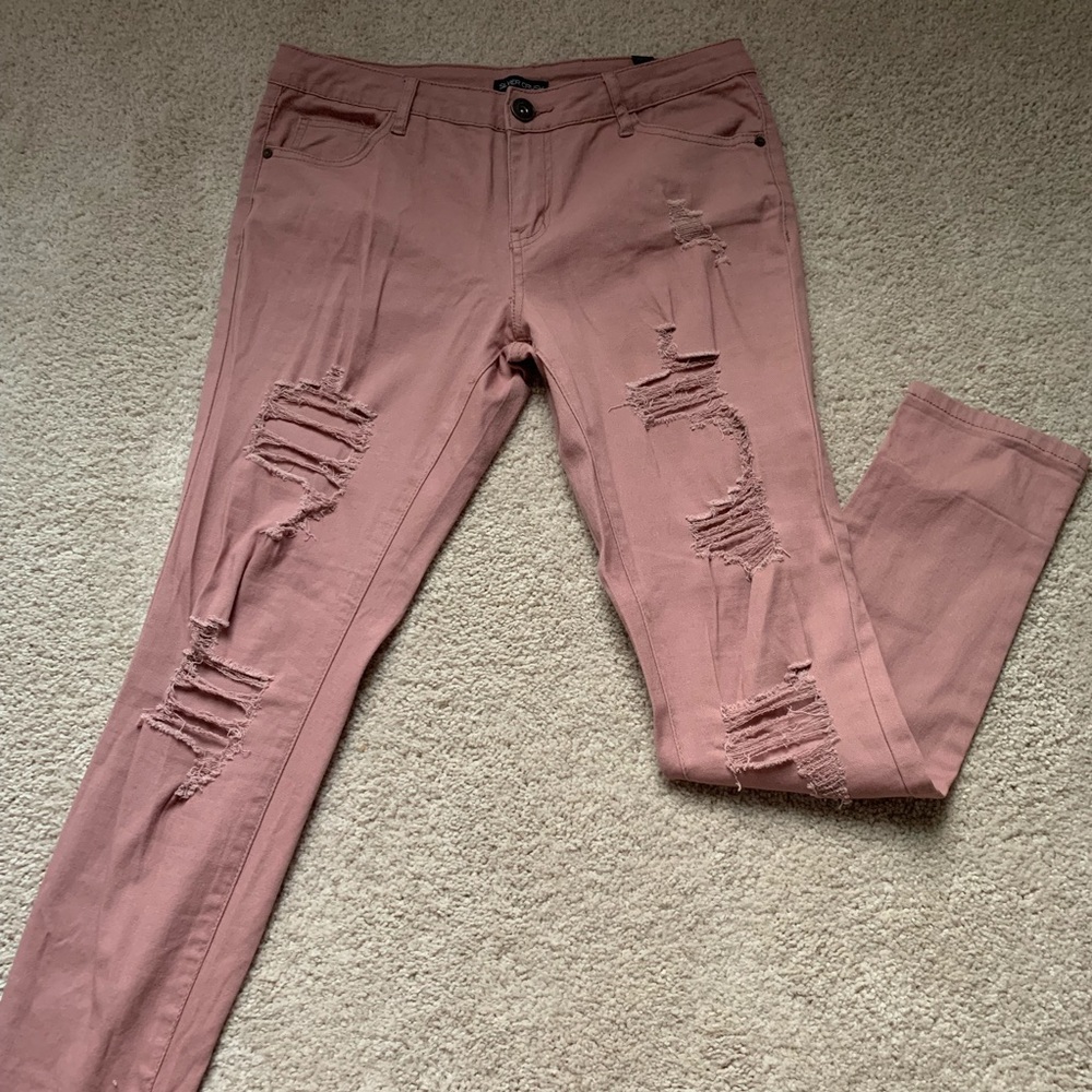 Mauve colored ripped jeans. Size 7/8